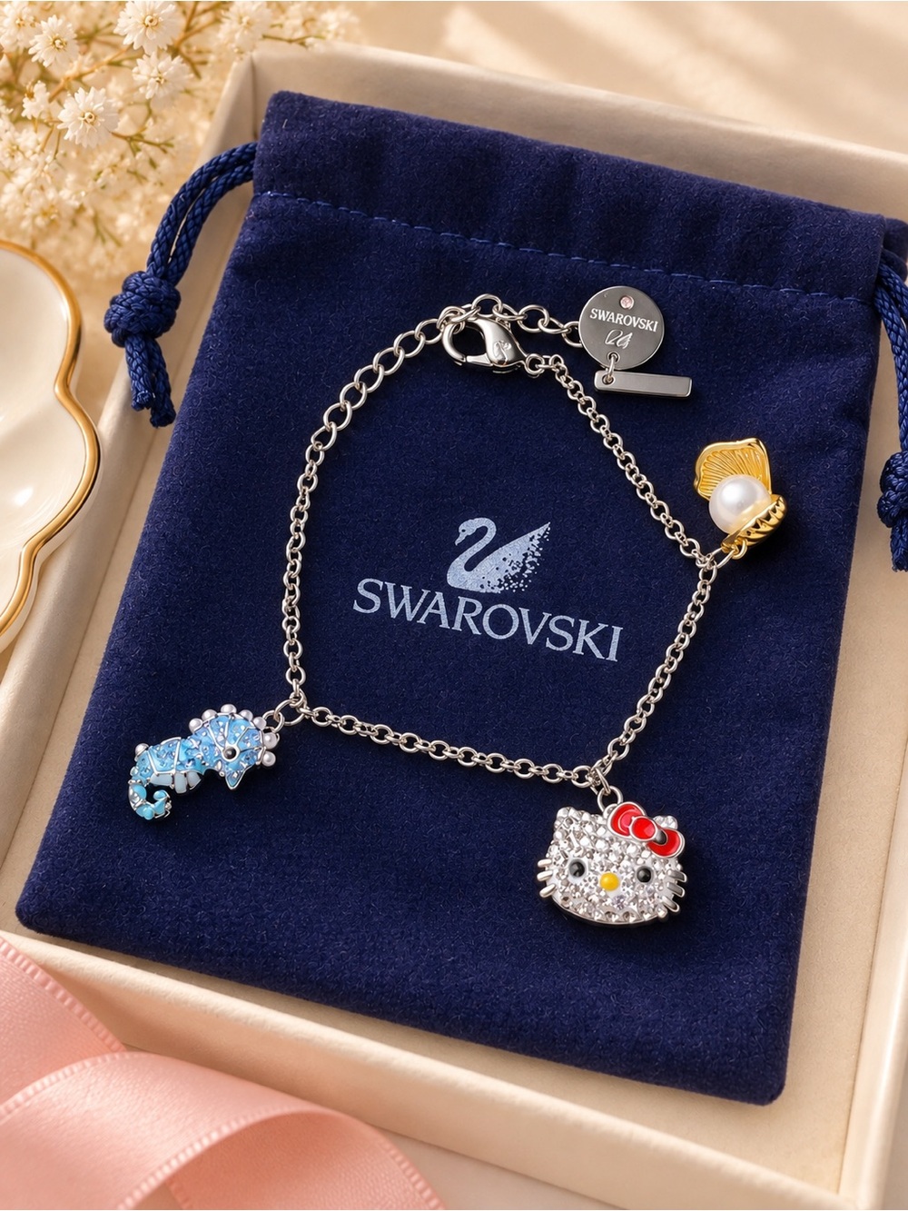 Swarovski Hello Kitty & Charm Bracelet in Silver with Blue and Red Accents
